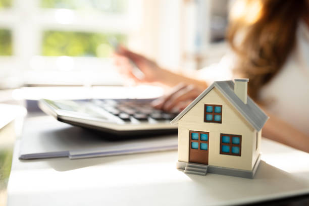 istock Close-up Of A House Model 1164644786