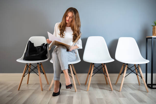 istock Young Woman Waiting For Job Interview 1164644825