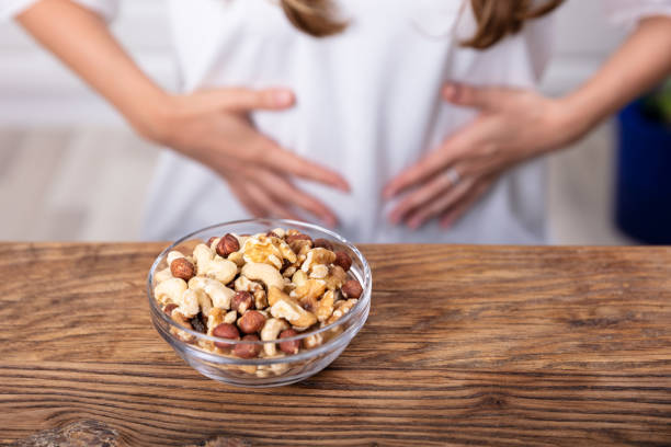 istock Woman Suffering From Stomach Pain 1164645452