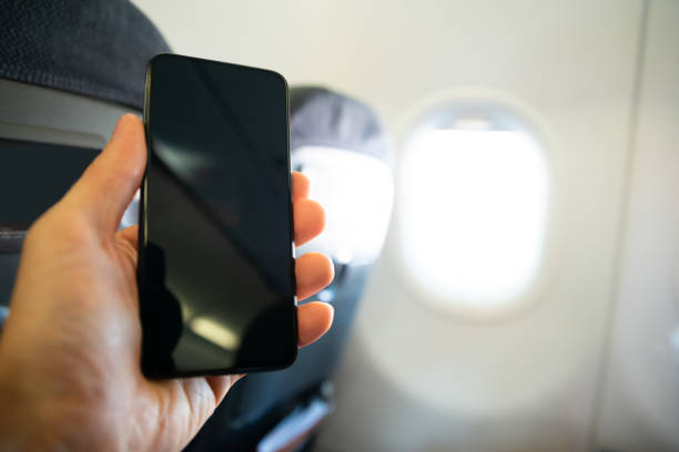 istock Man Hand Holding Mobilephone 1164645754