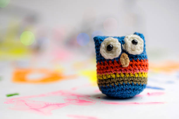 istock homework, bound owl and background of colorful beautiful background 1164647428