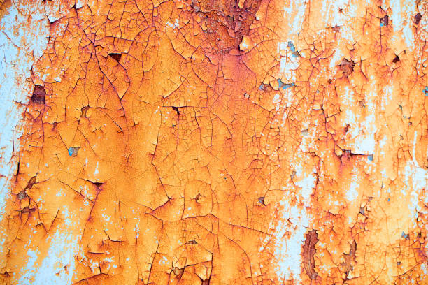 istock old rusty metal cracked texture with white paint 1164648368