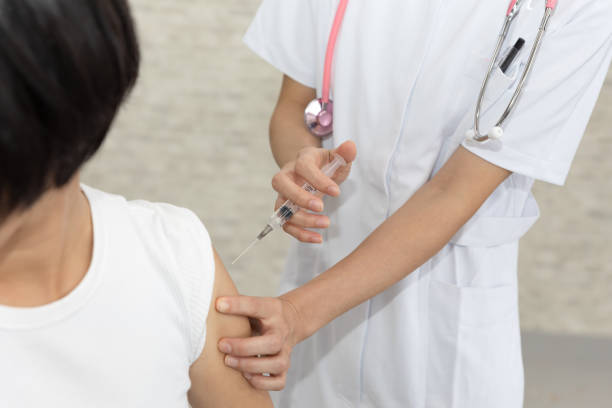 istock Nurse giving an injection 1164652356