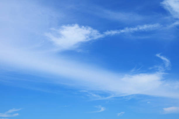 istock Tropical bright blue sky with pure white clouds 1164652623