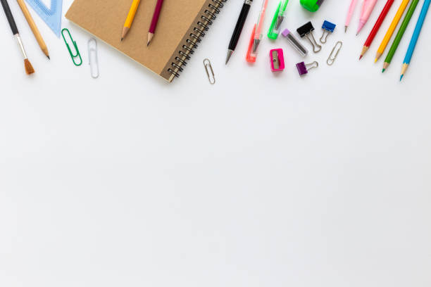 istock Top view of school supplies on a white background 1164653769