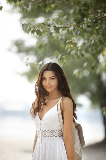 istock Young Woman on the Beach in Summer 1164658446