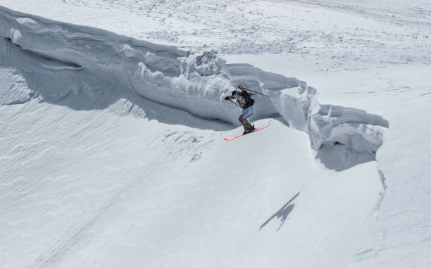 istock Flying skier on mountains. Extreme winter sport 1164659726