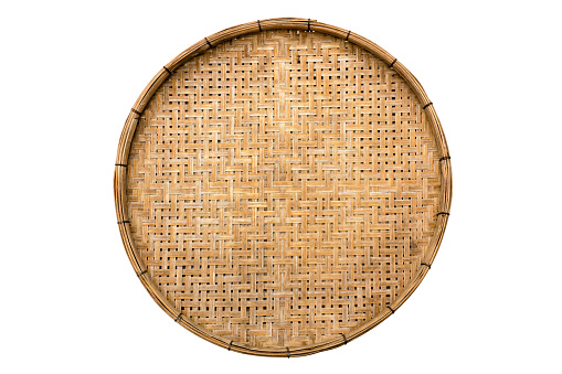 Old weave bamboo wood tray isolated on white background. Bamboo basket handmade isolated