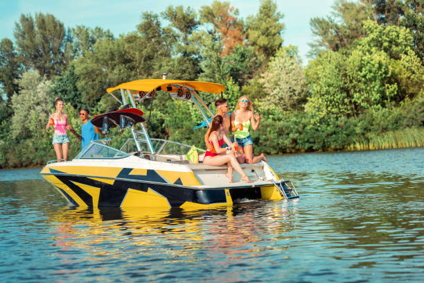istock Good friends drinking and talking on a boat 1164660042