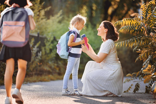 istock Parent and pupils go to school 1164664502