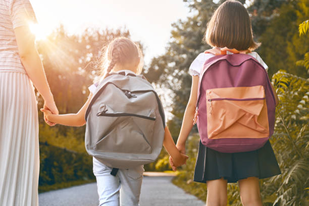 istock Parent and pupils go to school 1164664543