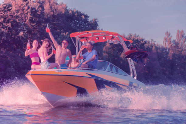istock Overjoyed good friends drinking in a pleasure boat 1164665417