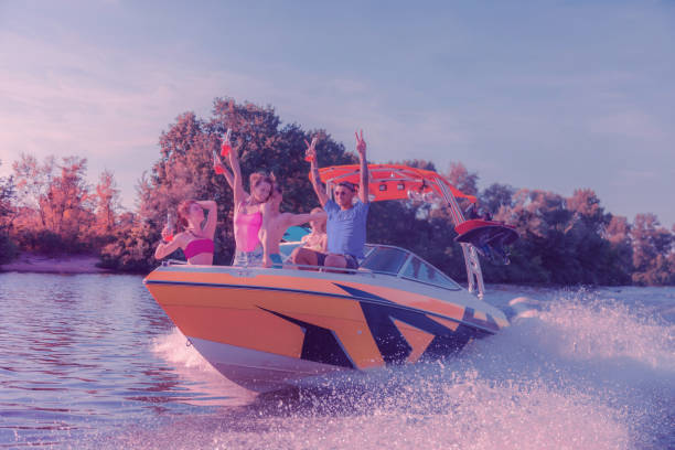 istock Company of millennials amusing themselves at a summer party 1164665436