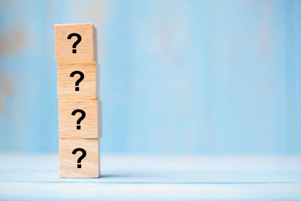 istock Questions Mark ( ? ) word with wooden cube block on blue table background. FAQ( frequency asked questions), Answer, Q&A, Information, Communication and Brainstorming Concepts 1164669461