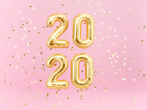 istock New year 2020 celebration golden confetti on pink background 1164670546