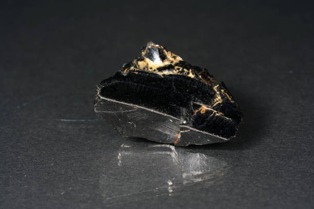 istock Shungit is a black rock that consists mainly of carbon 1164672605