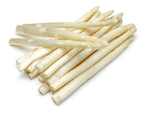 istock Bunch of white asparagus isolated on white 1164672678