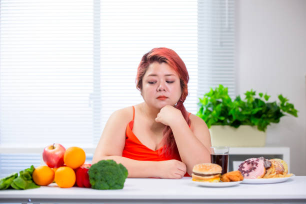 istock woman think about healthy food 1164676051