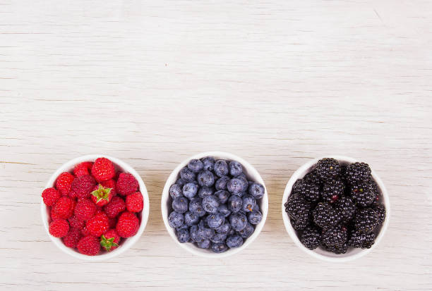 istock Variety of berries on white background. Berries Copy space. Top view 1164676334
