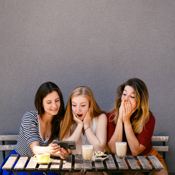 istock Shocked girls learning breaking news 1164678725