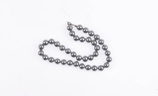 istock pearl jewelry necklace isolated on white background 1164680175