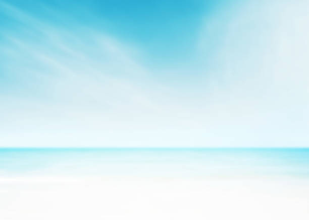 istock The blur cool sea background on horizon tropical sandy beach; relaxing outdoors vacation with heavenly mind view at a resort deck touching sunshine, sky surf summer clouds and light blue wave ocean. 1164682272