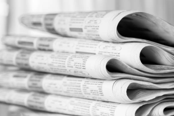 istock Newspapers folded stack, the concept of world news 1164684639