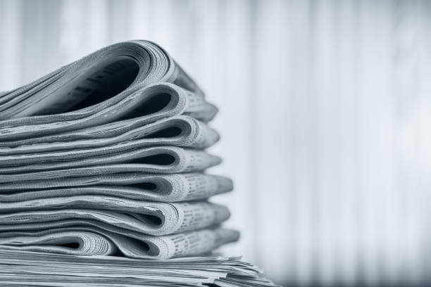 istock Newspapers folded stack, the concept of world news 1164684654