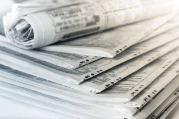 istock Newspapers folded stack, the concept of world news 1164684695