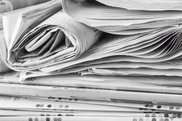 istock Newspapers folded stack, the concept of world news 1164684725