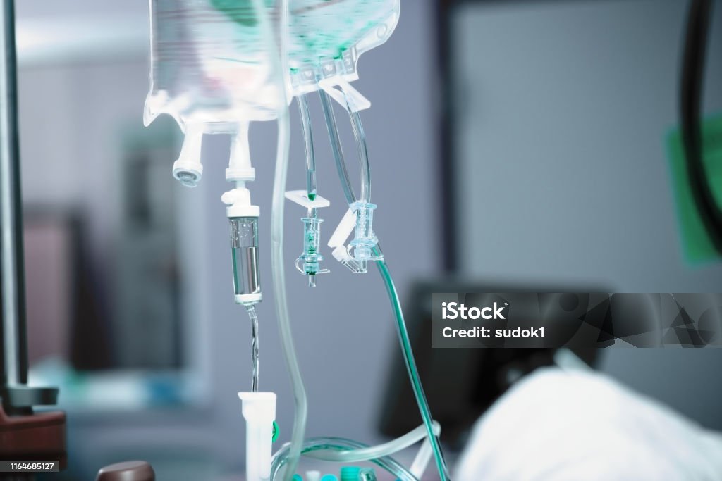 Intravenous drip bag on the ready for use in the hospital room Intravenous drip bag on the ready for use in the hospital room. IV Drip Stock Photo