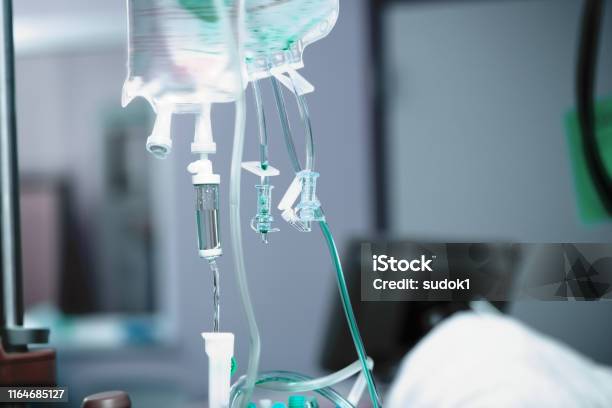 Intravenous Drip Bag On The Ready For Use In The Hospital Room Stock Photo - Download Image Now