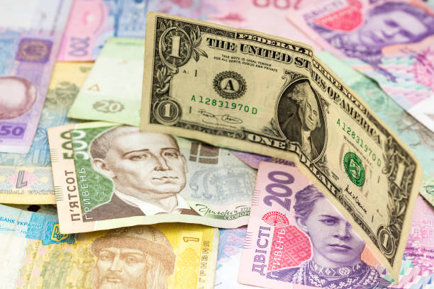 istock various ukrainian hryvna and one dollar banknote trade exchange concept 1164685189