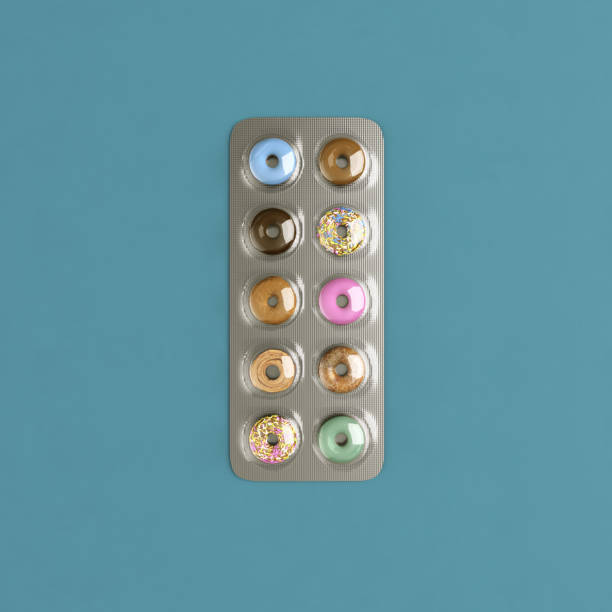 istock Blister pills donuts diet concept food packed inside. 1164690104