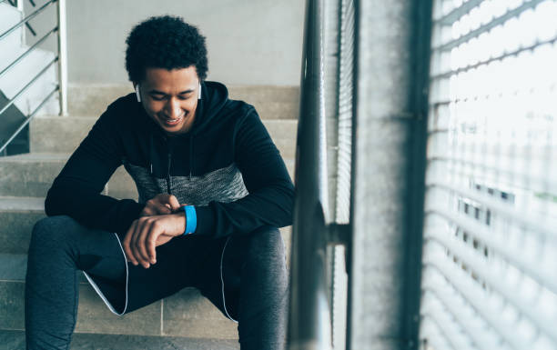 istock Sportsman checking his smart watch 1164691698