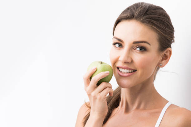 istock Perfect woman with apple 1164691766
