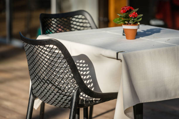 istock Chairs and table cafes on the outdoor terrace. 1164697449