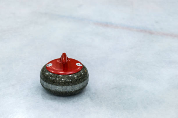istock Granite stones for curling game on the ice 1164700031