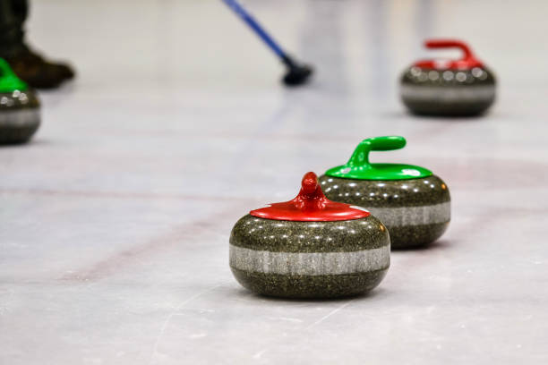 istock Granite stones for curling game on the ice 1164700052
