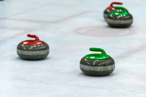istock Granite stones for curling game on the ice 1164700087