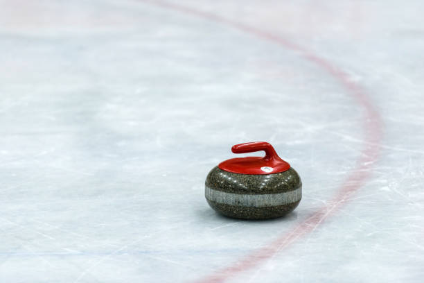 istock Granite stones for curling game on the ice 1164700144