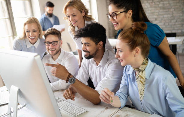 istock Business, technology and people concept - creative team or designers working in office 1164703472