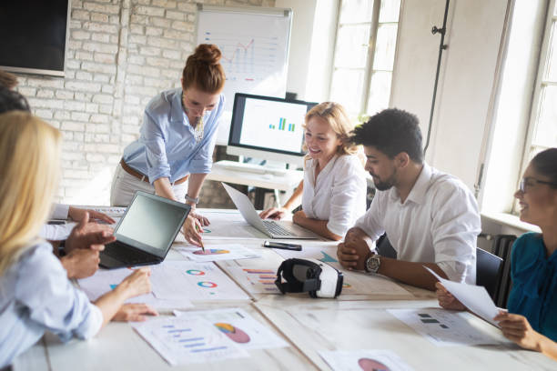 istock Creative business people working on business project in office 1164704303