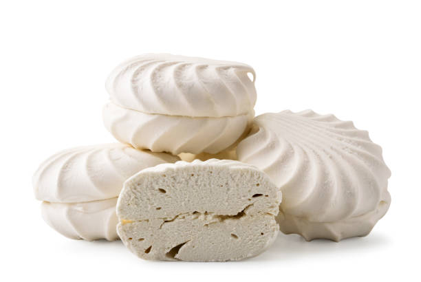 istock Heap of zephyr marshmallows with a half close-up on a white. Isolated. 1164704861