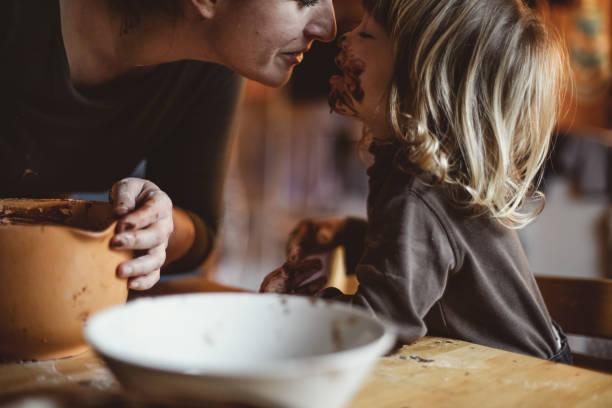 istock Toddler Making Cookies With His Mother 1164707543