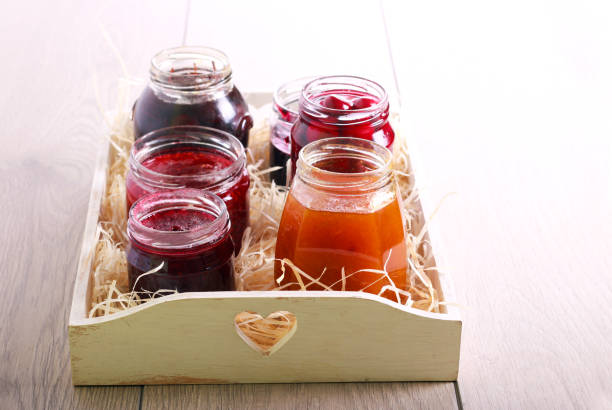 different types of fruit homemade jams and preserves - preserves jar apricot marmalade imagens e fotografias de stock