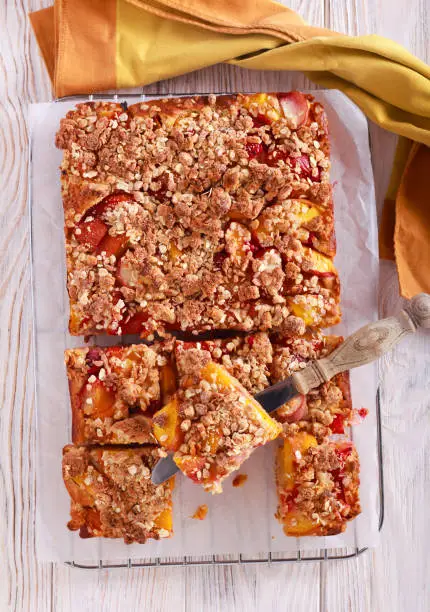 Oaty fruit crumble topping squares on wire rack