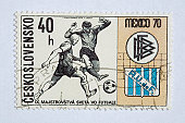 Close up of post stamp showing soccer players