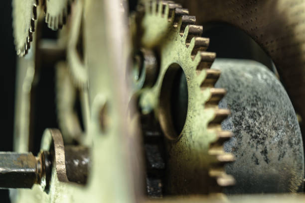 istock Close up old gears watch on a dark background. 1164719660