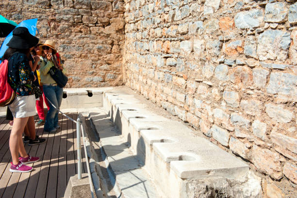 public toilet scholastica baths ephesus turkey - toilet public restroom ephesus history imagens e fotografias de stock